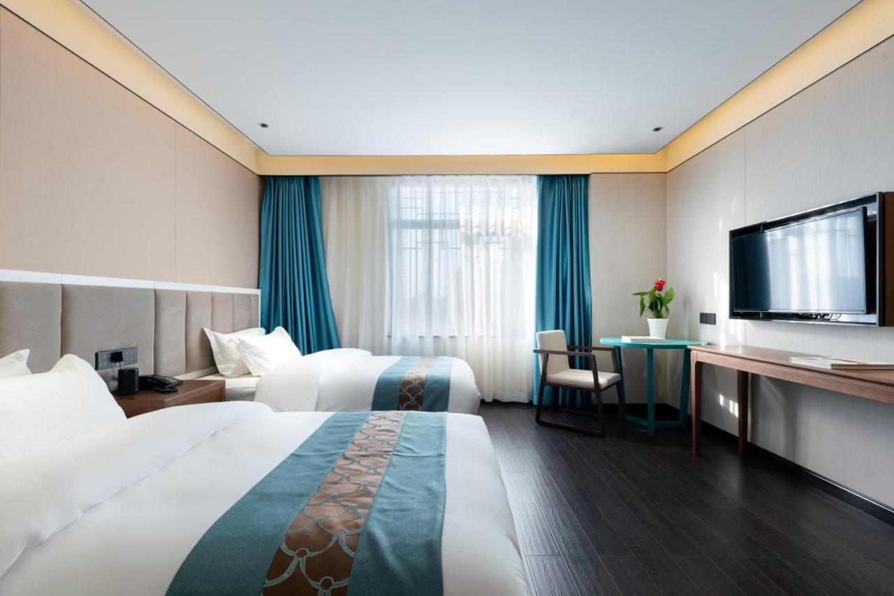 Beijing Tangfu Hotel - Located In The City Center Adjacent To The Subway Station Close To Nanluoguxiang Gulou Lama Temple Tiananmen Square Forbidden City Temple Of Heaven Providing Laundry Car Rental And Ticketing Services Екстер'єр фото